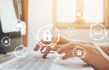 Businessman working on laptop. Protection network security computer and safe your data concept. Digital crime by an anonymous hacker